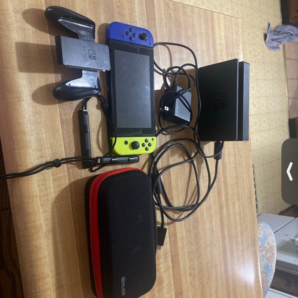 Nintendo Switch with Blue and Yellow Joy-Con Controllers